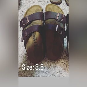 Brown Birkenstocks. Lightly worn.